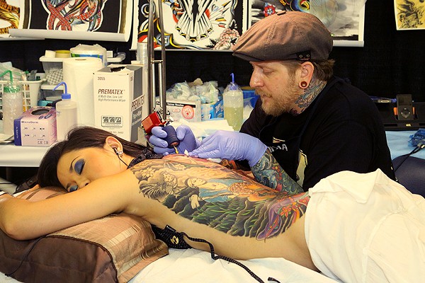 Jedidiah Reid working at a past Alamo City Tattoo Show. - JOHN BONILLA