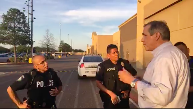 Sen. Jeff Merkley talks with Brownsville police outside of an center housing immigrant children. - VIA SEN. JEFF MERKLEY'S FACEBOOK PAGE