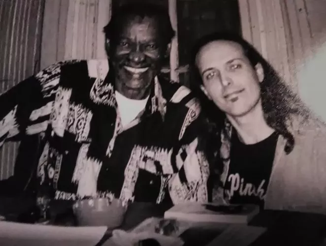 Monte Adams (right) poses for a photo with legendary blues guitarist Gatemouth Brown. - VIA GEORGE BRISCOE'S FACEBOOK PAGE