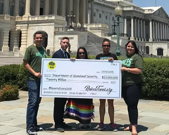 RAICES officials show their $20 million check in front of the Capitol Building in Washington D.C. - VIA RAICES'S FACEBOOK PAGE