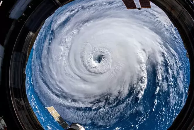 Hurricane Florence, as photographed from the International Space Station, is expected to linger over the Carolinas all weekend. - NASA