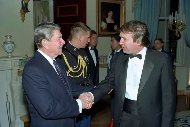 "Self-made man" Donald Trump meets President Ronald Reagan in this photo of a 1987 White House reception. - WHITE HOUSE