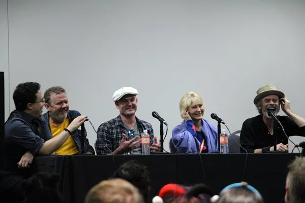 Moderator Moisés Chiullán and the E.T. cast share a laugh during Saturday's panel - KELLY MERKA NELSON