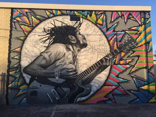 Mural of Nic Long of Lonely Horse off the N. St. Mary's Stip - FACEBOOK / LONELY HORSE