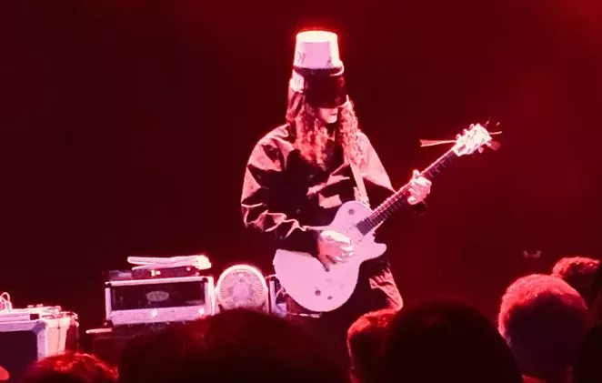 Enigmatic guitar shredder Buckethead shows off his technique from the Aztec stage. - MIKE MCMAHAN