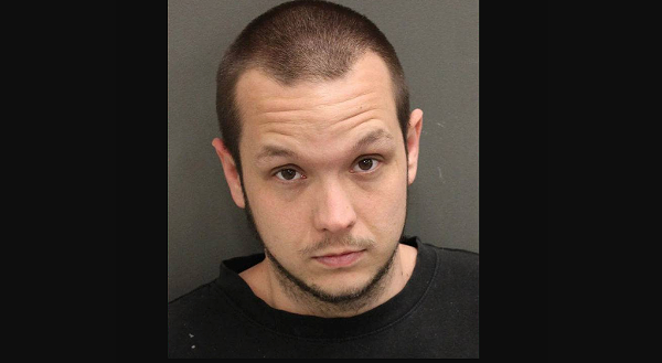 Richard Brown, 25, is facing a number of charges in Florida. - ORANGE COUNTY JAIL