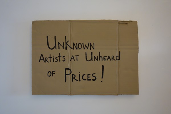 Diaz lampoons the art world in his sculptures that resemble signs that homeless people often carry. He began his art career in New York by selling these to tourists at Tiffany’s.