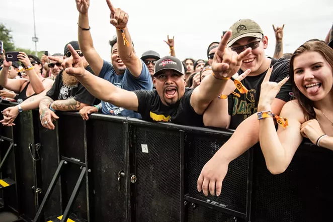 Fans at the barricade go crazy at a recent River City Rockfest. - JAIME MONZON