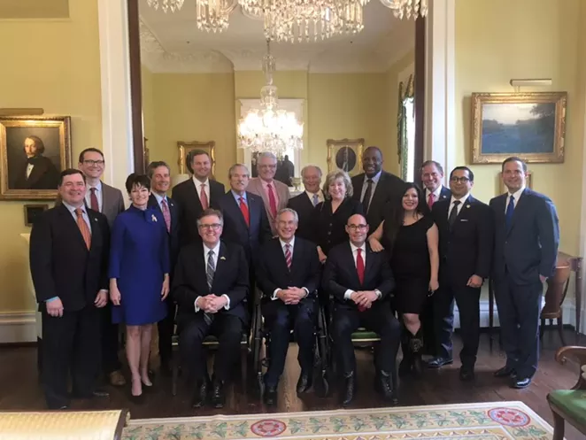 Gov. Greg Abbott, Lt. Gov. Dan Patrick, and House Speaker Dennis Bonnen stop for a photo op at the governor's mansion. - TWITTER / @REPDENNISBONNEN