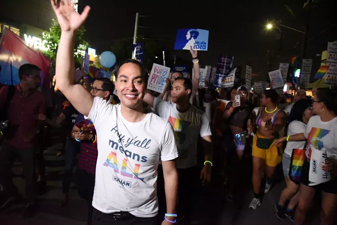 Julian Castro waves to the crowd during the Pride Bigger Than Texas Parade. - JULIAN LEDEZMA