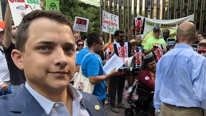 Briscoe Cain gets all troll-y with protestors outside the conservative American Legislative Exchange Council meeting in Austin. - TWITTER / @BRISCOECAIN