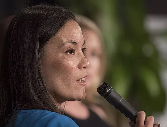 Gina Ortiz Jones speaks during an event last summer. - WIKIMEDIA COMMONS / JAY GODWIN