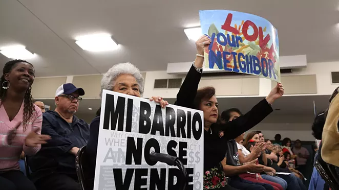 Elisa Diaz (center) and Bertie Diaz-Gonzales attend a City Council candidate forum hosted by COPS Metro Alliance in April at St. Patrick’s Catholic Church, where gentrification and affordable housing was the hot topic. - BEN OLIVO / SAN ANTONIO HERON