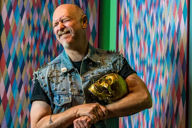 Heyd Fontenot cradles a skull in the first version of his installation The Lodge of Saint Reborlaro in Tulsa, Oklahoma. - CHRIS CREESE