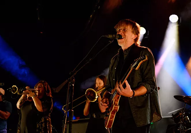 Anastasio's band, featuring both a horn section and extra percussionist, adopt new arrangements for some familiar Phish tunes. - JOHN DAVID SCARCLIFF