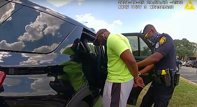 Body cam footage shows officers detaining jogger Mathias Ometu last week. - YOUTUBE / SAN ANTONIO POLICE DEPARTMENT
