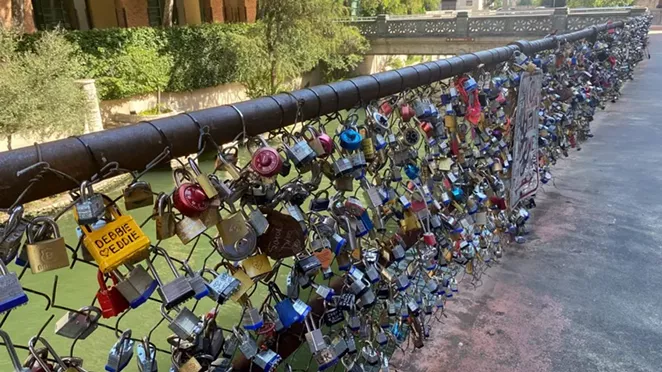 The “Love Lock Bridge” is located between Market Street and the Kallison Walk bridge. - BEN OLIVO / SAN ANTONIO HERON