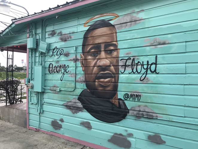 A George Floyd mural adorns the side of Big Poppas Tacos on San Antonio's East Side. - TWITTER / @ALEXGAMEZTV