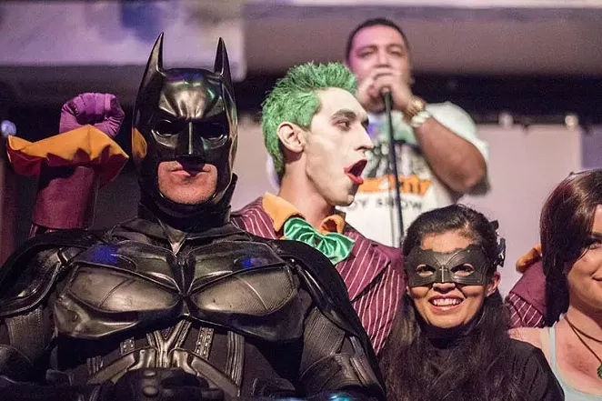 Alamo City Comic Con founder Apple de la Fuente addresses the audience behind a group of San Antonio Cosplayers during the ACCC Thank You party in early 2014. - RICK CANFIELD