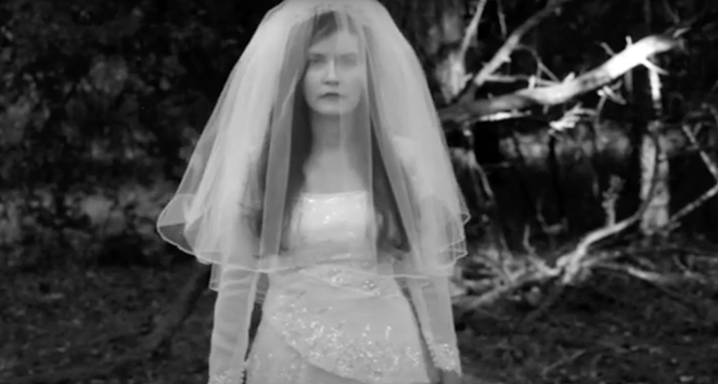 Hyperbubble singer Jessica walks through the woods in the duo's eerie new video. - YOUTUBE CAPTURE / HYPERBUBBLE