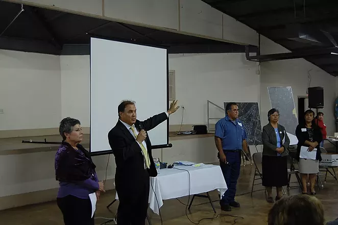 Bexar County Commissioner Chico Rodriguez speaks at a Highland Oaks community meeting. - MICHAEL MARKS