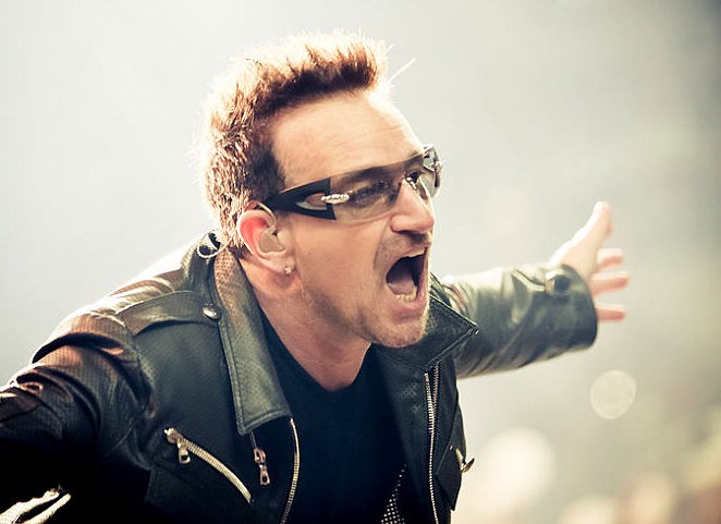 "Gimme some fookin' money for the homeless people, ya shite!" is what Bono is probably not saying. - VIA WIKIPEDIA