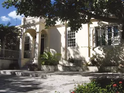 The front door to Finca Vigia; a rendering of the archival facility by The Christian Company