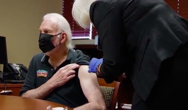 Spurs Coach Gregg Popovich receives a COVID-19 vaccine in a new public service announcement. - SCREEN CAPTURE / NBA CARES