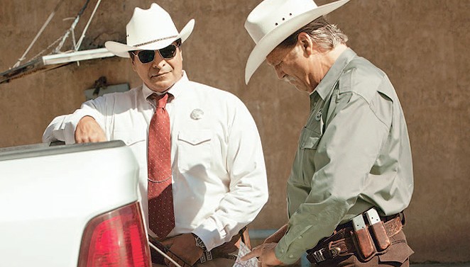 Texas Rangers Alberto Parker (Birmingham) and Marcus Hamilton (Bridges) hunt down a pair of West Texas bank robbers in Hell or High Water. - CBS FILMS