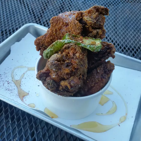Get your own bucket o' wings — you won't want to share. - KIM OLSEN
