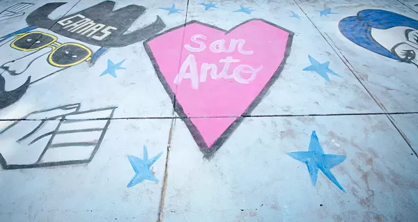 A CHALK MURAL BY LOCAL ARTIST CRUZ ORTIZ
