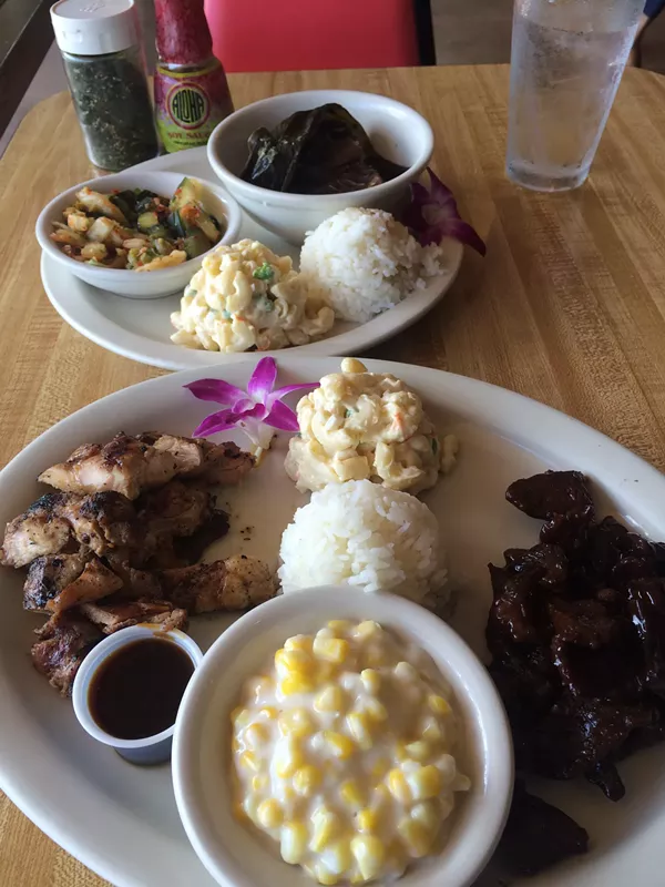 Clockwise from top left: Kimchi, lua lua, Draggin' Meat, coconut cream corn, huli huli chicken