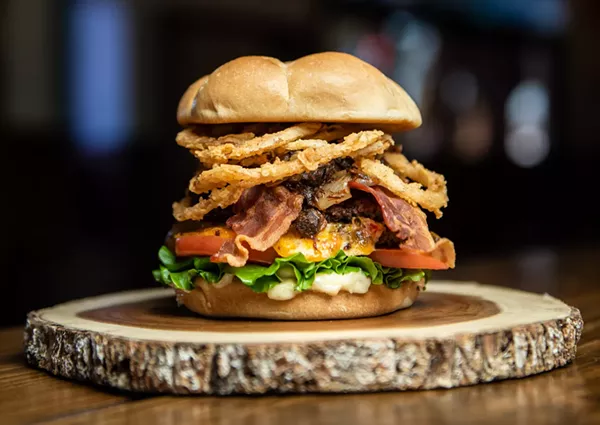 In addition to plenty of fixin's, Lucy Cooper's Texas Ice House's burger features Dr. Pepper onion jam. - JAIME MONZON