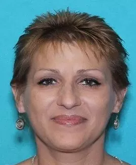 Officials identified the body found burning on the side of the road last year as 47-year-old Lisa Carter