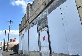 The Whitt Printing Co. building facing West Houston Street. - SA HERON / BEN OLIVO