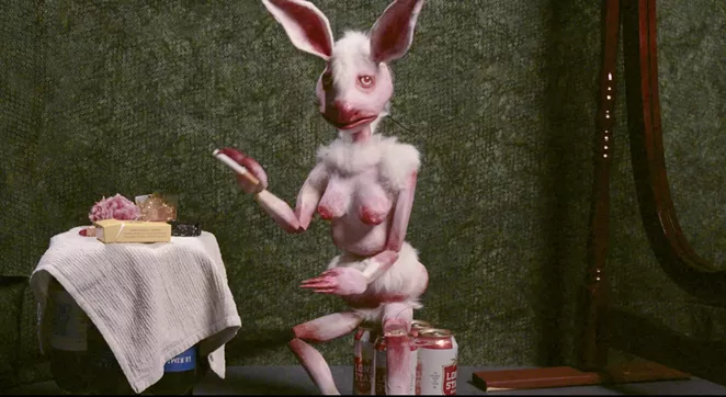 Sarah Fox, Bad Bunny, 2021, Digital video, 4 min 30 seconds, Created and directed by Sarah Fox, Cinematography and editing by Anders Lilleberg, Puppeteering by Michael Julian. Soundscape by Ryan Foerster, Set materials and location supplied by Brick at Blue Star Arts Complex, Courtesy of the artist - COURTESY OF BLUE STAR CONTEMPORARY
