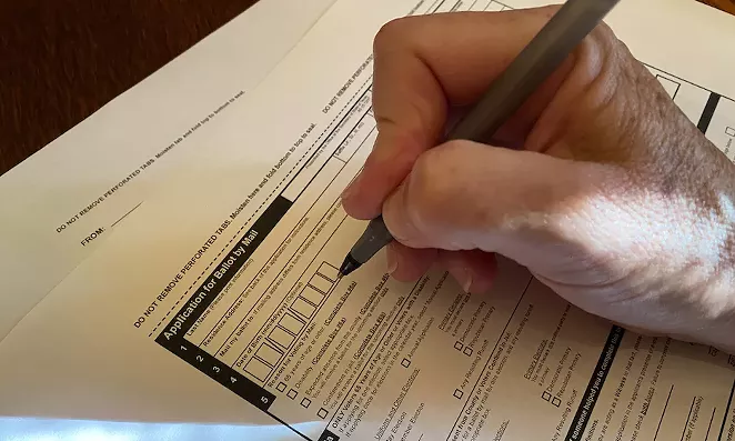 Under Texas' Republican-authored voting legislation, people who apply to vote by mail can have their applications rejected if they incorrectly remember which kind of ID number the state already has on file for them. - SANFORD NOWLIN