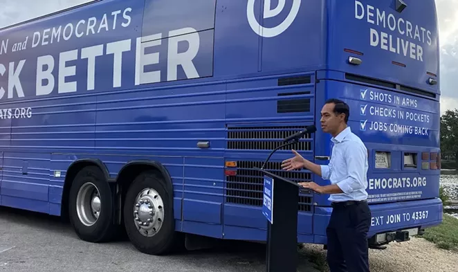 Former San Antonio mayor Julián Castro speaks at the Build Back Better bus tour at Woodlawn Lake Park. - SANFORD NOWLIN