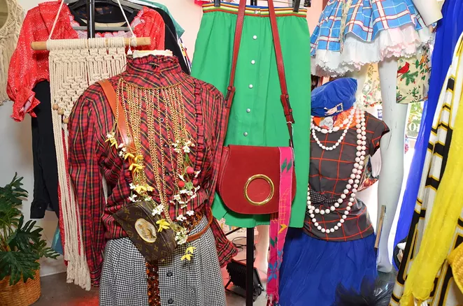The displays at Augustine showcase Cuellar’s eclectic fashion sense. - BRYAN RINDFUSS