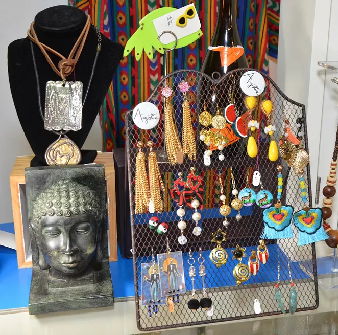 Reconfigured accessories are among Cuellar’s top sellers at Augustine. - BRYAN RINDFUSS
