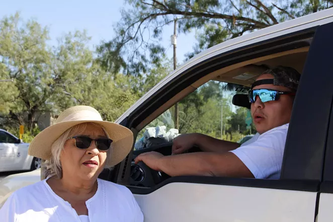 Pamela Rivas and her son Ivan commiserate over Border Patrol surveillance. - GUS BOVA