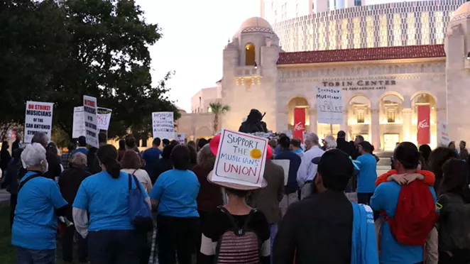 San Antonio Symphony musicians and supporters gather in front of the Tobin Center for Friday's rally. - KATELYN EARHART