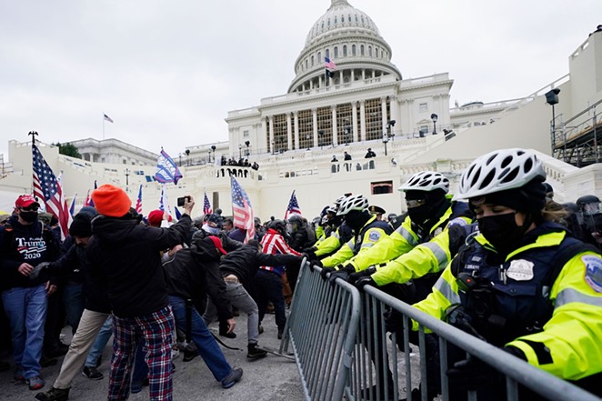 Insurrectionists tangle with police during the January 6 insurrection at the U.S. Capitol. - SHUTTERSTOCK