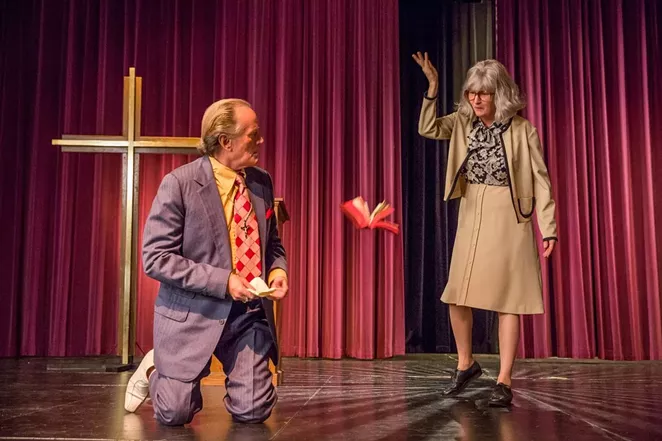 Madalyn Murray O’Hair (Melissa Leo) debates Reverend Harrington (Peter Fonda) on religion in The Most Hated Woman in America. - NETFLIX