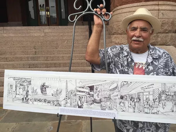 Joe Lopez stands beside his rendering of San Antonio's "the good old times." - MONICA SIMMONS