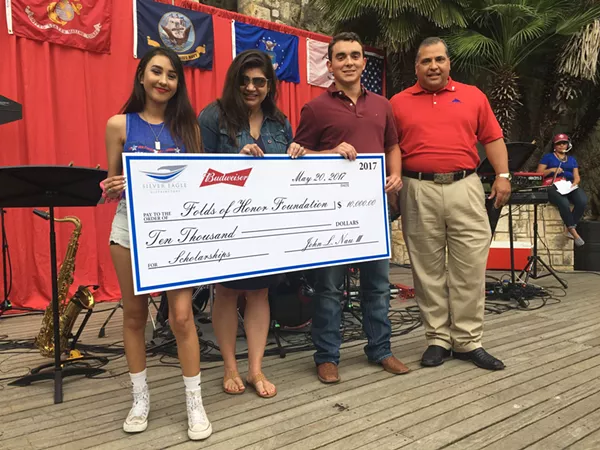 Raquel Castro (left) and Marcus Greydanus (second from right) each receive $5,000 awards - COURTESY OF SILVER EAGLE DISTRIBUTOR