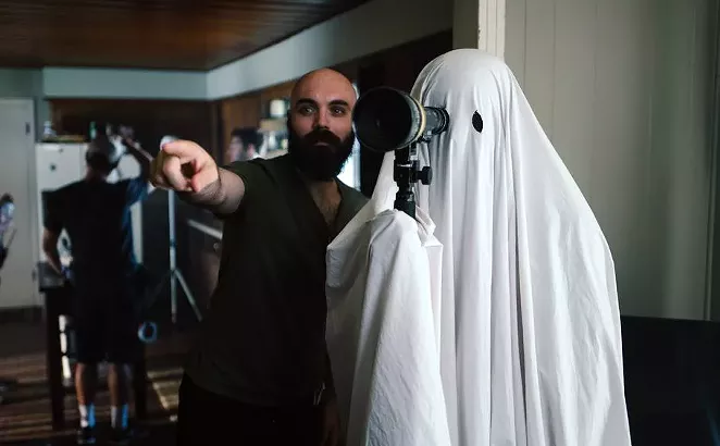 Filmmaker David Lowery on the set of A Ghost Story. - A24