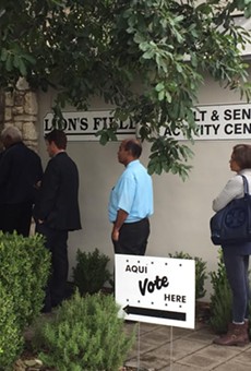 Voters wait in line to cast their ballots at Lion's Field.