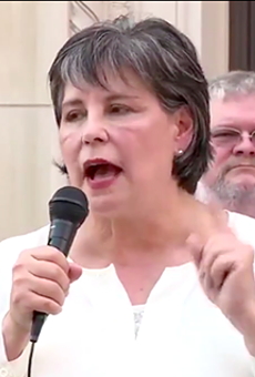 Cynthia Brehm speaks at a recent rally at which she claimed the coronavirus pandemic is a Democratic hoax.