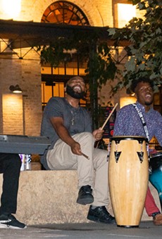 Trio Raps About 'Putting Unity Back Into the Community' During a Flash Pearl Park Performance